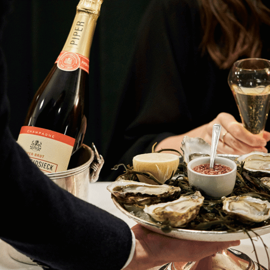 Piper champagne at Bentley's Oyster Bar & Grill in Mayfair, London