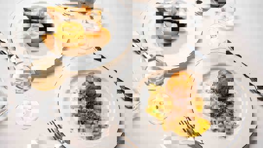 Festive holiday table setting with oysters and champagne at Bentley’s Oyster Bar, a seafood restaurant in Mayfair.