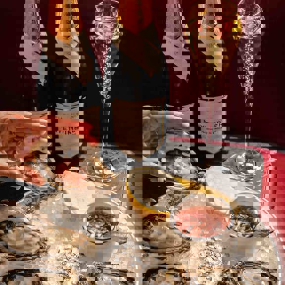 Oysters and champagne at Bentley's Oyster Bar & Grill seafood restaurant in Mayfair, London