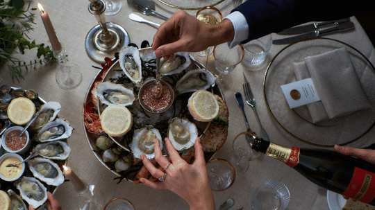 Oysters and champagne at Bentley's Oyster Bar & Grill seafood restaurant in Mayfair, London