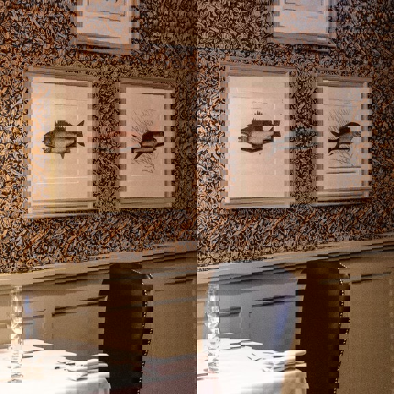 fish pictures on wall at Bentley's Oyster Bar & Grill seafood restaurant in Mayfair, London