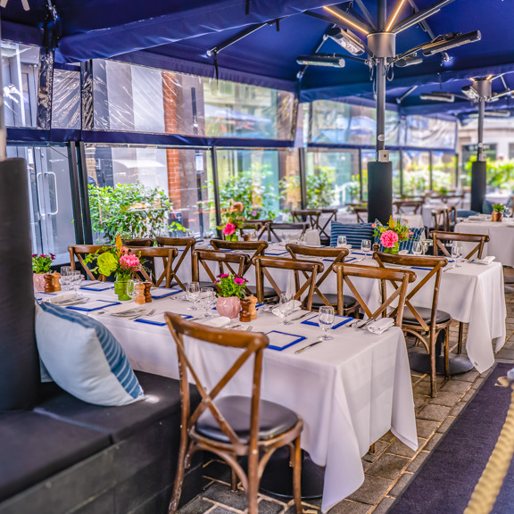 Terrace with chairs and tables At Bentley's