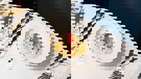 Festive table setting with oysters and sparklers at Bentley’s, a seafood restaurant in Mayfair.