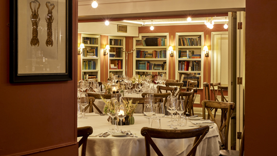 Cozy dining area at Bentley’s Oyster Bar, a charming seafood restaurant in Mayfair.
