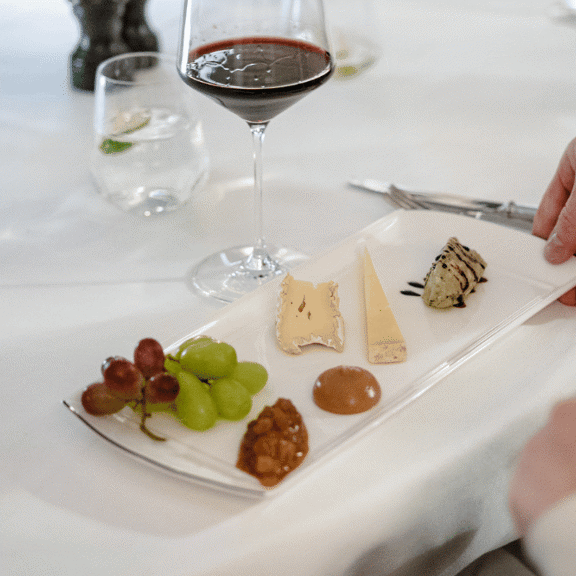 cheese and grapes at Bentley's Oyster Bar & Grill seafood restaurant in Mayfair, London