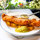 Golden fried fish and thick-cut chips served with tartar sauce at Bentley’s, a fish restaurant in Mayfair.