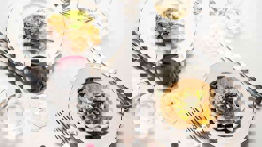 Festive table setting with wine at Bentley’s Oyster Bar, a top fish restaurant in Mayfair.