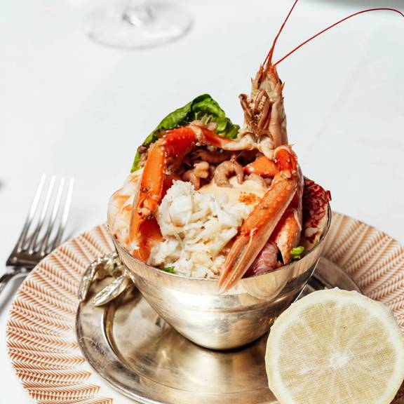 Shellfish cocktail elegantly presented on ice at Bentley’s Oyster Bar, a top seafood restaurant in Mayfair.