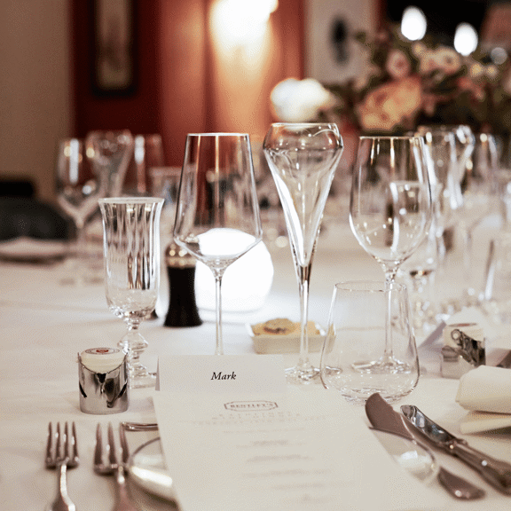 glasses on table at Bentley's Oyster Bar & Grill seafood restaurant in Mayfair, London